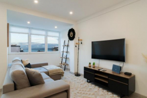 Stylish Apartment W/ River View by LovelyStay
